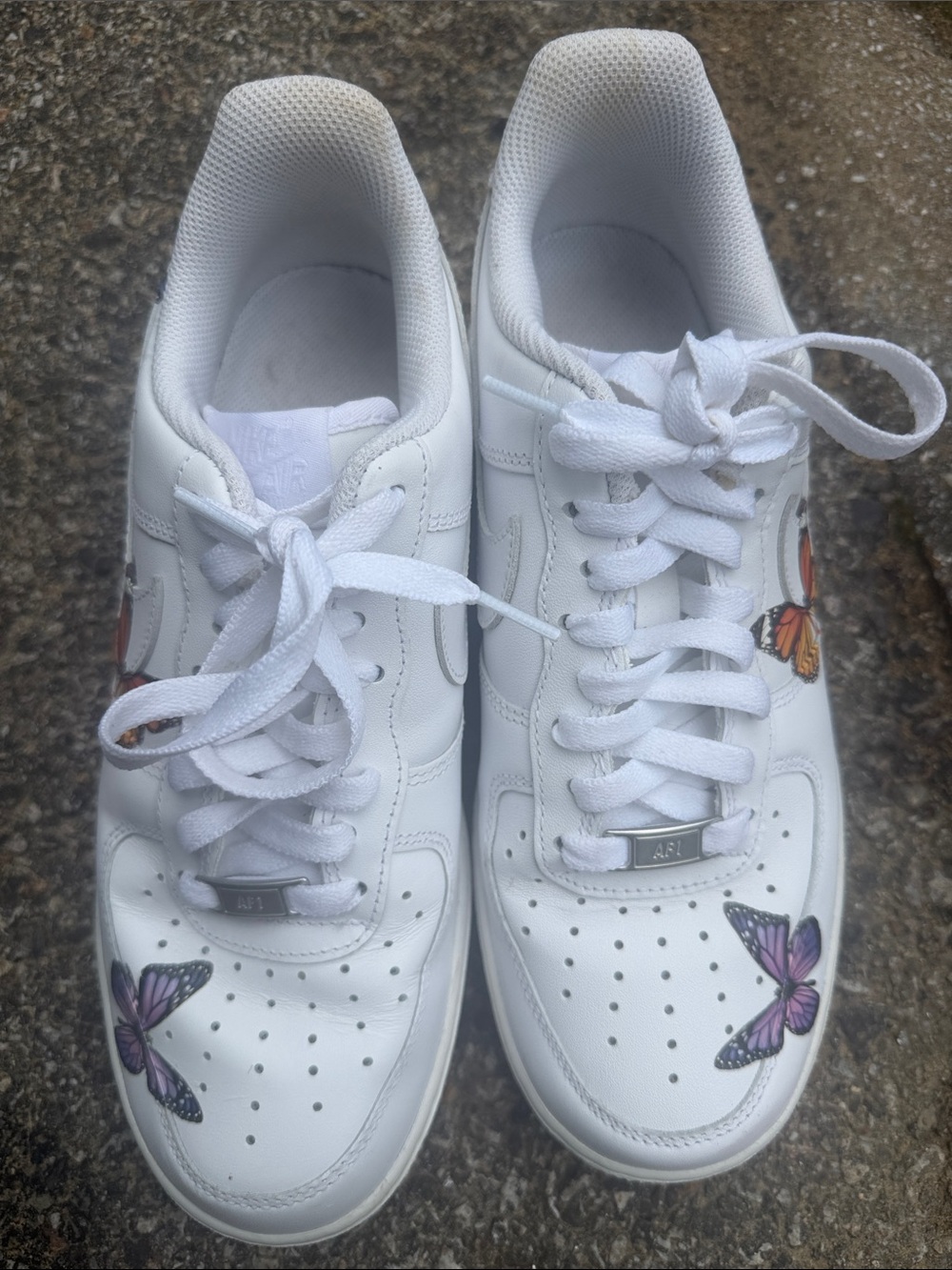 Nike White Low-Top Sneakers with Orange and Purple Butterfly Accents - Picture 3 of 3